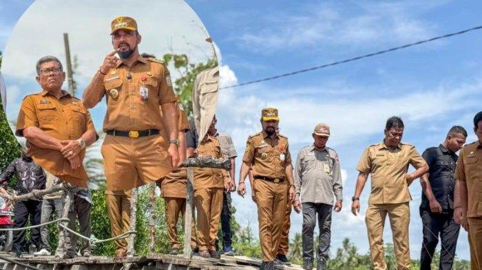 Bupati Aceh Timur Iskandar Usman Al-Farlaky saat meninjau dua jembatan yang sudah rusak dan lapuk, masing-masing di Gampong Seunebok Aceh menuju Bale Buya, serta jembatan di kawasan Seneubok Pesangan dan Dama Tutong, Senin (14/7/2025).