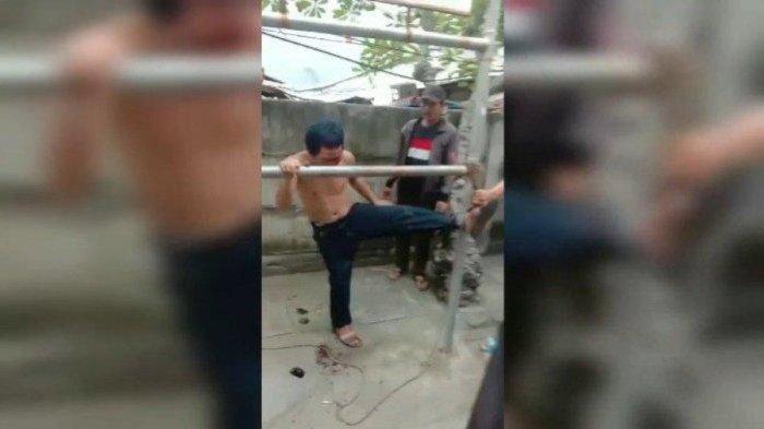 Diduga hendak maling motor, pria diikat ke tiang lalu dikeroyok warga di Tanjung Priok