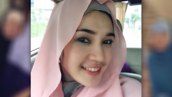 Dhini Aminarti