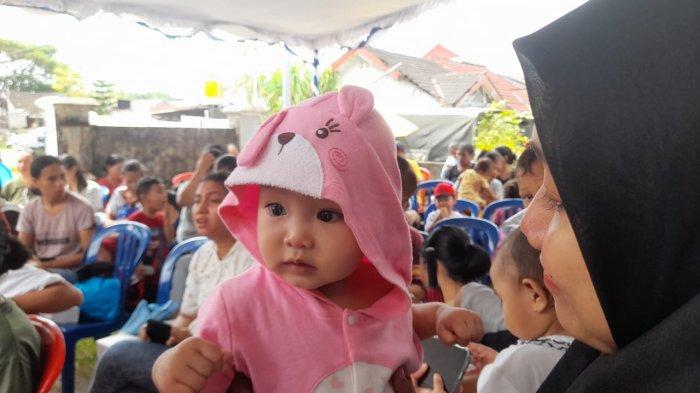Pekan Imunisasi Nasional (PIN) Polio Tahap II yang menyasar anak-anak usia 0 hingga 7 tahun di Negeri Lama, Passo, Senin (29/7/2024).
