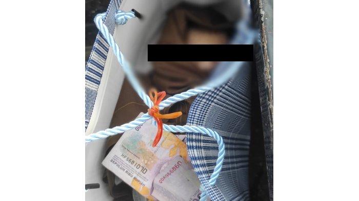 Sosok mayat bayi yang ditemukan pada bak mobil pick up di Padangsambian Klod, Denpasar, Bali pada 10 Mei 2024.