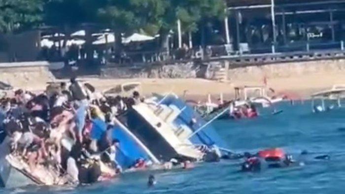 Sebuah boat cepat karam setelah diterjang ombak di Pelabuhan Tanjung Sanghyang, Desa Lembongan, Kecamatan Nusa Penida, Klungkung, Rabu (4/6/2025).