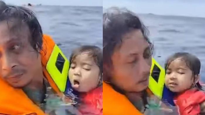 KECELAKAAN KAPAL - Seorang lelaki menyelamatkan penumpang anak kecil saat kecelakaan di KM Barcelona VA, Perairan Pulau Talise, Minut, Sulawesi Utara, Minggu (20/7/2025).