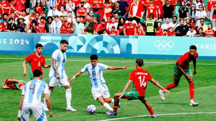 Pertandingan Argentina vs Maroko di Olimpiade Paris 2024 sempat dihentikan selama hampir 2 jam sebelum kembali dilanjutkan, Rabu (24/7/2024)