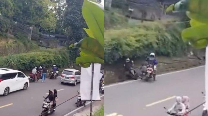 PATWAL PEPET PEMOTOR - Tangkapan layar video aksi seorang petugas patwal pepet pengendara motor hingga terjatuh ke selokan di Puncak Bogor, beredar viral di media sosial, Jumat (14/3/2025). Begini nasib Aipda H, oknum anggota patroli dan pengawalan (patwal) yang viral ketika mengawal mobil mewah Alphard di Puncak Bogor, Jawa Barat.
