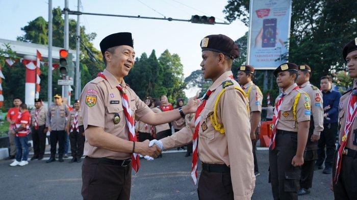Hari Lahir Pramuka yang ke-62, Kwartir Cabang (Kwarcab) Gerakan Pramuka Kota Bogor kibarkan Sang Merah Putih di Tugu Kujang, Senin (14/8/2023). Pengibaran ini pula, masih serangkaian dengan Festival Merah Putih (FMP) Tahun 2023.