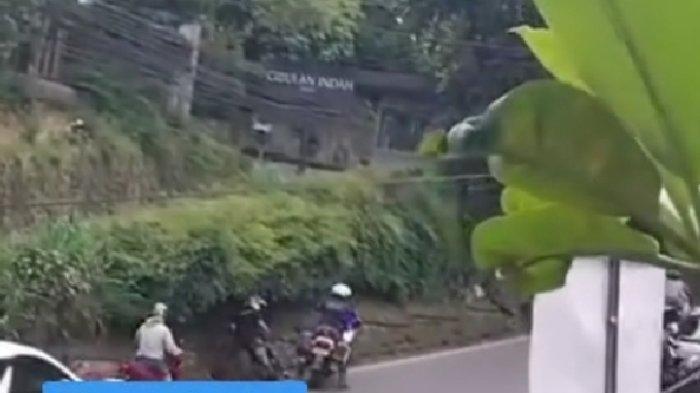 PATWAL TENDANG MOTOR-Momen Patwal diduga mengintimidasi pengendara motor di Bogor, Jawa Barat itu dibagikan akun Instagram @Bogor24update pada Jumat (14/3/2025).