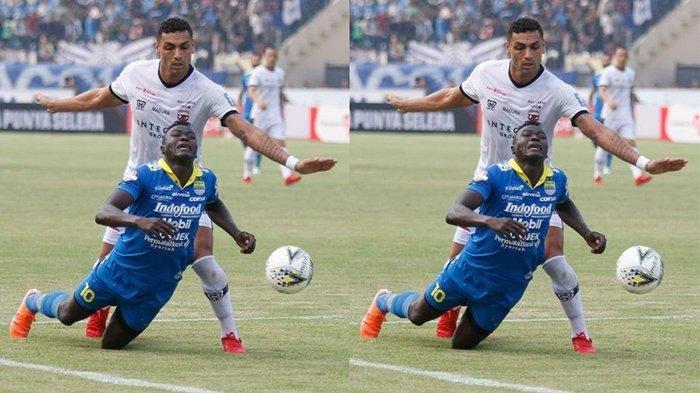 Penyerang Persib Bandung, Ezechiel N Douassel berduel dengan bek Madura United, Jaimerson da Silva, dalam laga di Stadion Si Jalak Harupat, Minggu (24/6/2019).