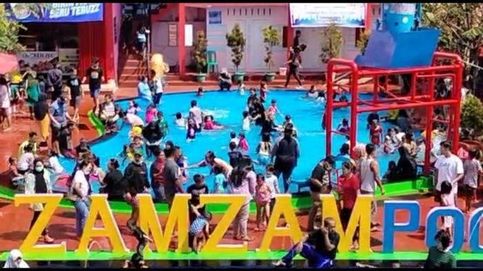 Pengunjung Zamzam Pool Kuningan membeludak saat libur lebaran 2021. Pengelola pun memberlakukan pembatasan kuota dan protokol kesehatan.