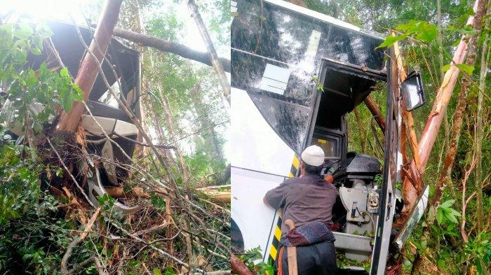 WARGA melihat kondisi dua bus Asal Sumatera Selatan yang mengelami kecelakaan tunggal masuk ke jurang di lintasan Terangun Babahrot kecamatan Terangun kabupaten Galus, Minggu (30/7/2023).