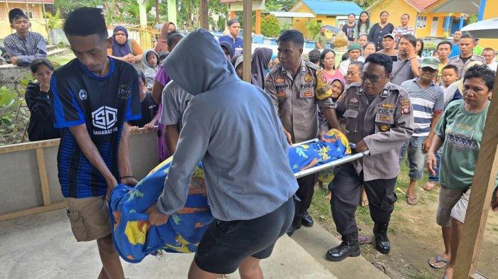 PENEMUAN MAYAT -- Detik-detik evakuasi mayat perempuan oleh sejumlah warga dan personel Polsek Suwawa. Mayat perempuan itu langsung diidentifikasi oleh polisi.