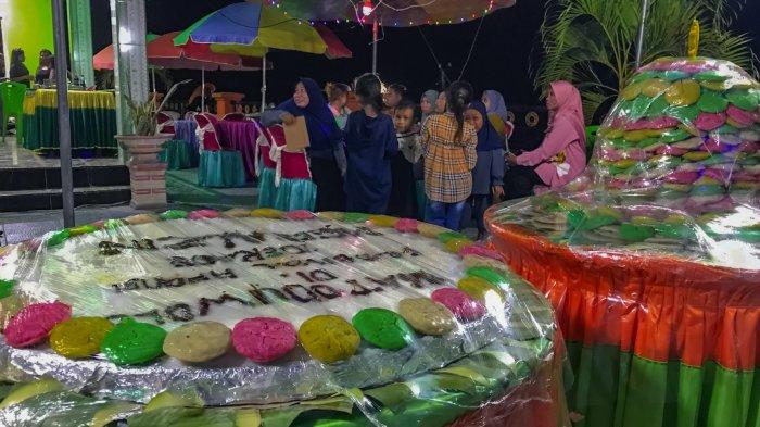 FESTIVAL APANGI--Festival Apangi itu dilaksanakan di Kelurahan Dembe Satu, Kecamatan Kota Barat, Kota Gorontalo ini untuk memperingati hari Asyura 10 Muharam 1447 Hijiriah, Sabtu malam (5/7/2025). Foto: TribunGorontalo.com/Jefri Potabuga.