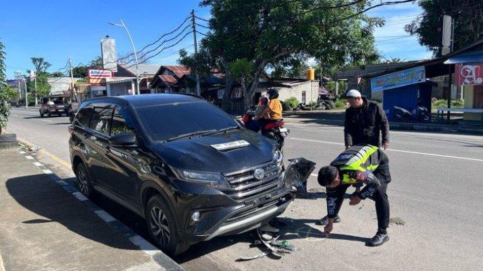 OLAH TKP - Polantas Gorontalo Kota melakukan olah TKP kecelakaan motor vs mobil, Kamis dini hari (3/4/2025). Kecelakaan ini menelan dua korban jiwa.