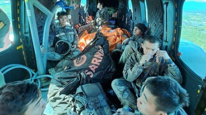 Aparat Gabungan TNI-Polri berhasil mengevakuasi korban kontak tembak antara Satgas Operasi Paro 2023 Gabungan TNI Yonif Satgas Yonif R 321/GT dengan Kelompok Kirminal Bersenjata (KKB) Egianus Kogeya di Mugi, Kabupaten Nduga, Papua Pegunungan. (Tribun-Papua.com/Istimewa)