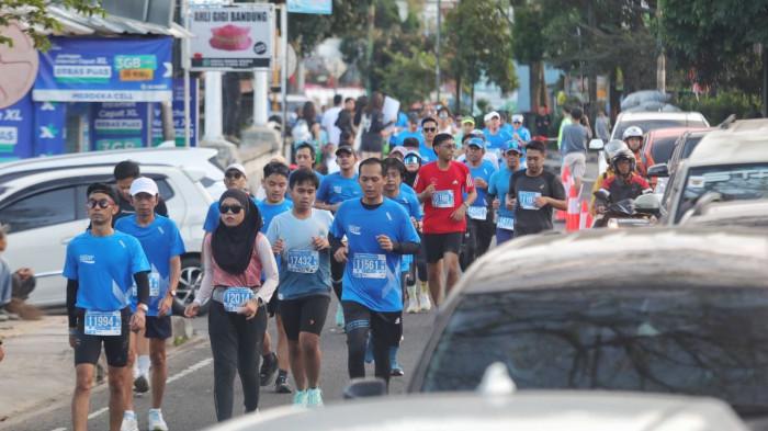 BIKIN MACET - Lomba lari Pocari Sweat Run, Minggu (20/7/2025). Event ini dikeluhkan warga karena bikin macet.