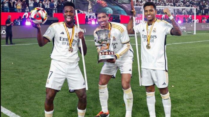 Trio sekawan Vinicius Junior, Rodrygo, dan Jude Bellingham. Real Madrid mengalahkan Barcelona di partai puncak (final) Piala Super Spanyol dengan skor meyakinkan 4-1 di Al Awwal Stadium.