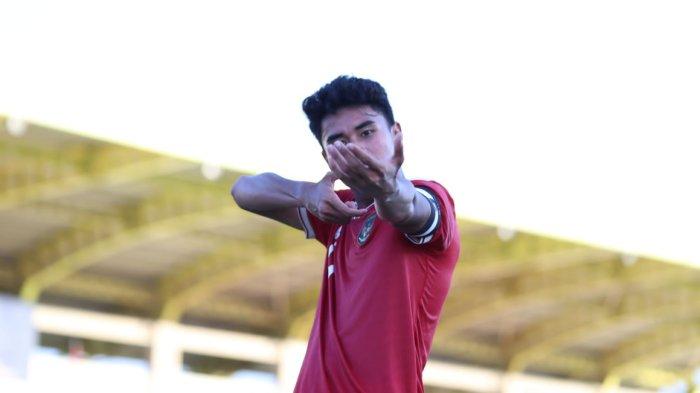 Muhammad Ferarri berselebrasi bak sniper usai cetak gol lawan Moldova.
