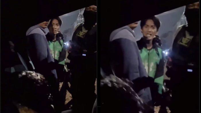 Seorang pelajar laki-laki menangis di mobil polisi lantaran tertangkap setelah tawuran.