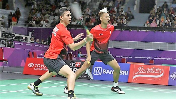 Fajar Alfian/Muhamammad Rian Ardianto menjadi penentu kemenangan tim Indonesia atas India detelah mengalahkan Manu Attri/Sumeeth Reddy di partai keempat bulutangkis beregu Asian Games 2018, Senin (20/8/2018). Kemenangan itu membuat tim putra Indonesia memastikan tiket semifinal.