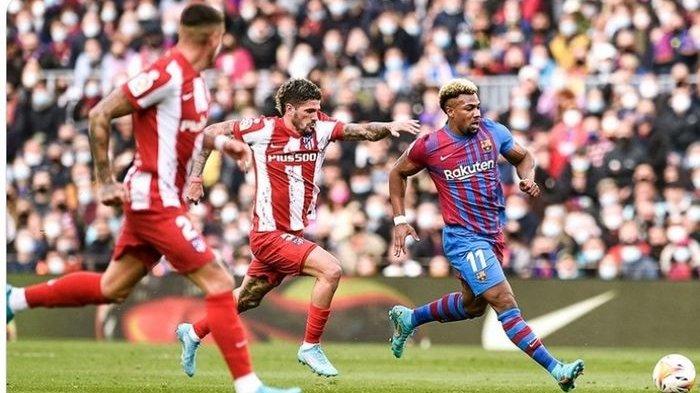 Aksi Adama Traore bersama Barcelona dalam laga kontra Atletico Madrid.