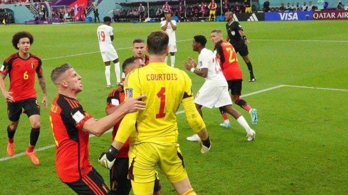 Selebrasi penjaga gawang Timnas Belgia usai menggagalkan tendangan penalti Timnas Kanada di Piala Dunia 2022 pada Kamis (24/11/2022) dini hari.