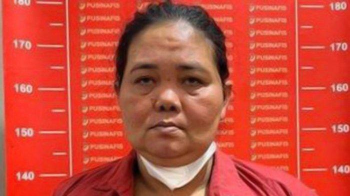 Nina Wati (47) tersangka penipuan bermodus meluluskan masuk Akademi Kepolisian (Akpol) (Tribun Medan)