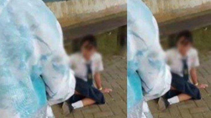 AKHIR KASUS BULLYING - Tangkapan layar video siswa SMP di Kalimantan Tengah menangis saat didorong hingga jatuh oleh temannya, Minggu (9/2/2025). Akhir kasus siswa SMP dibully tersebut akhirnya orangtua bertemu orangtua.