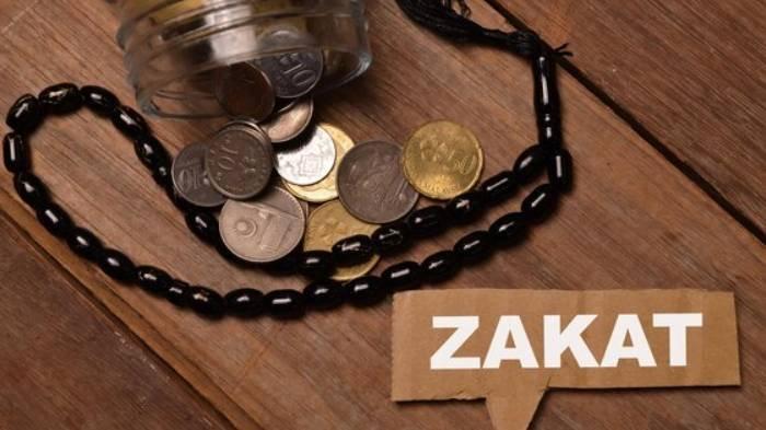BAYAR ZAKAT - Ilustrasi pembayaran zakat.