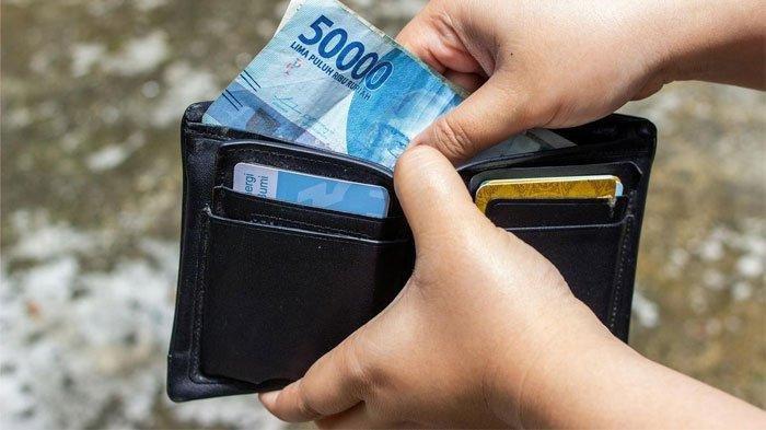 ILUSTRASI UANG - Seorang siswa terpaksa menggadaikan ponsel demi mendapatkan uang untuk ikut ujian praktek di sekolah