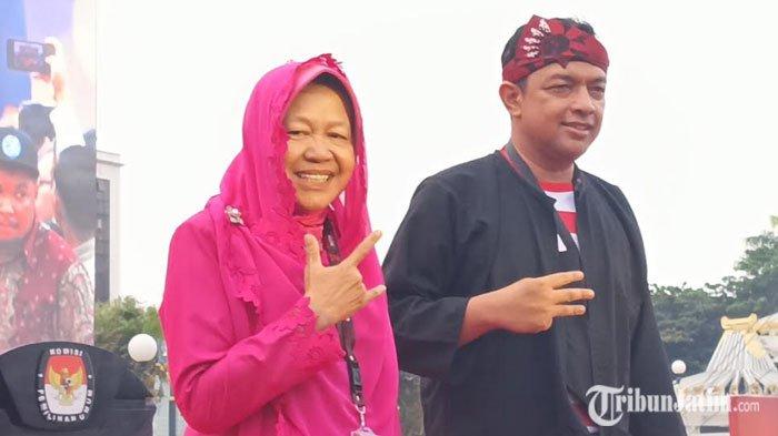 Pasangan calon nomor urut 3 Risma-Gus Hans saat hadir dalam deklarasi kampanye damai di Tugu Pahlawan Surabaya, Selasa (24/9/2024).