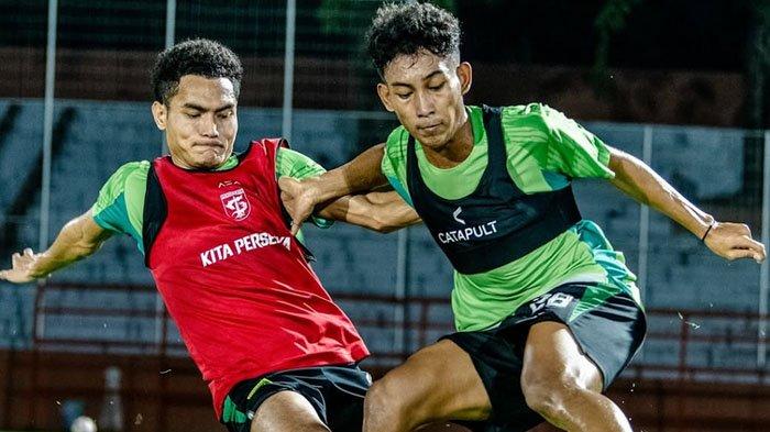 FOKUS - Pemain Persebaya Surabaya, Alfan Suaib (depan) dan Mikael Tata dalam sesi latihan tim di Stadion Gelora 10 November, Surabaya, Minggu (9/3/2025) malam. Latihan ini sebagai persiapan menjamu PSIS Semarang di Stadion GBT Surabaya, Rabu (12/3/2025) malam.
