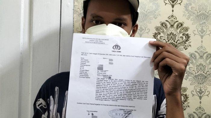 Reihan menunjukkan setelah ditipu sudah melapor ke Polrestabes Surabaya, Minggu (12/1/2025)