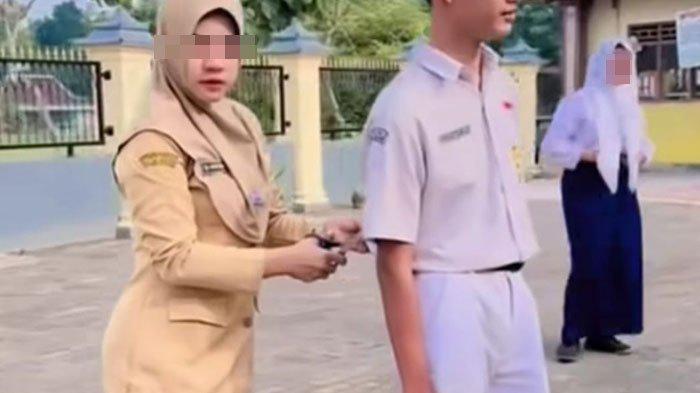 GURU GUNTING SERAGAM - Tangkapan layar video viral seorang guru memotong seragam murid. Guru tersebut kini memberikan klarifikasi, Selasa (22/4/2025).