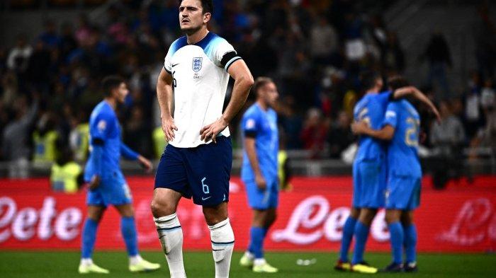 Ekspresi Bek Inggris Harry Maguire ketika para pemain Italia merayakan setelah pertandingan Grup 3 Liga A UEFA Nations League antara Italia dan Inggris, di Stadion San Siro di Milan pada Sabtub 24 September 2022.