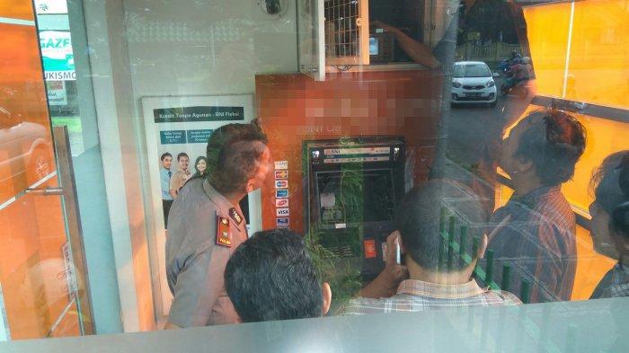 ILUSTRASI: Polisi melakukan olah TKP tempat kejadian perkara percobaan perusakan mesin ATM