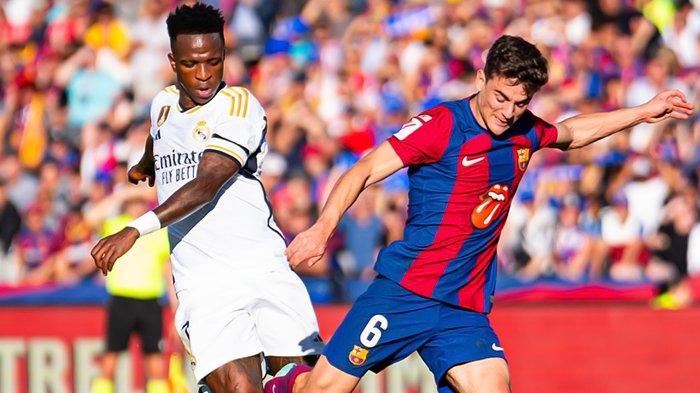 Duel Vinicius Junior dan Gavi pada laga El Clasico Barcelona vs Real Madrid di Liga Spanyol, yang digelar di Stadion Luis Companys, Sabtu (28/10/2023).