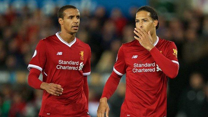 Pemain Liverpool Joel Matip dan Virgil van Dijk