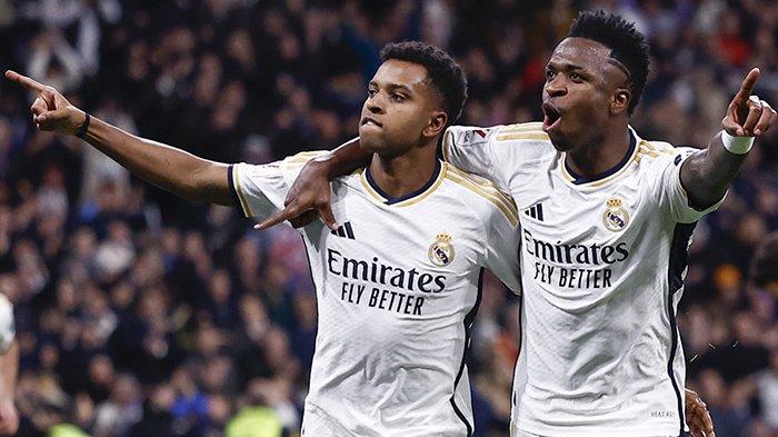 Selebrasi Rodrygo dan Vinicius Junior saat merayakan gol dalam kemenangan Real Madrid 4-0 atas Girona pada pertandingan Liga Spanyol, di Stadion Santiago Bernabeu, Minggu (11/2/2024). (Twitter / @realmadrid)