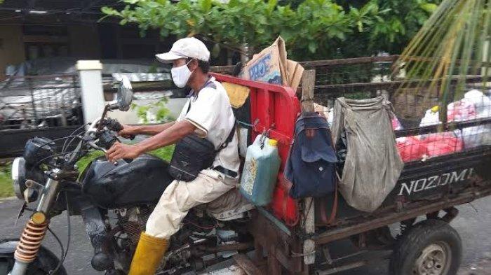 ilustrasi motor tiga roda pengakut sampah.