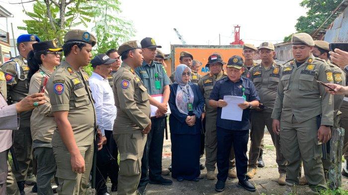 Pembacaan sita eksekusi ini telah dilakukan Pengadilan Negeri (PN) Balikpapan di Gang Perikanan RT 16 Kelurahan Baru Ulu, Kecamatan Balikpapan Barat, Balikpapan, Kalimantan Timur.TRIBUNKALTIM.CO/ARY NINDITA INTAN