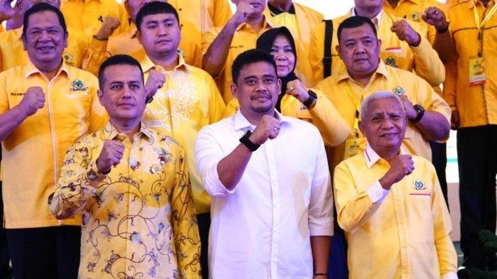 CAWAGUB BOBBY NASUTION - Ketua DPD Partai Golkar Sumatera Utara, Musa Rajekshah (kiri depan) mengumumkan Bupati Asahan Surya (kanan depan) menjadi Calon Wakil Gubernur Sumut mendampingi Bobby Nasution (tengah depan) di Pilkada Sumut 2024 mendatang. Respons mantu Jokowi soal usulan Golkar