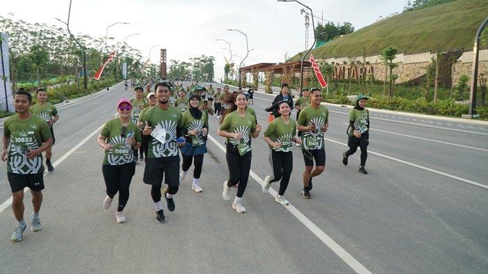 Peserta Nusantara TNI Fun Run 2024 yang digelar di Ibu Kota Nusantara, Minggu (6/10/2024) hari ini.