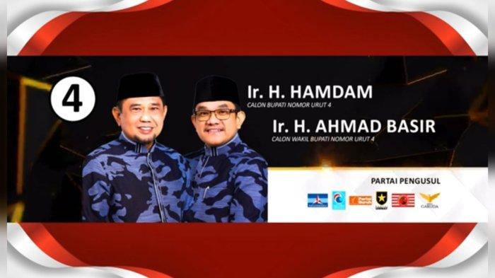 PILKADA PPU 2024 - Foto pasangan calon bupati dan wakil bupati Penajam Paser Utara, Hamdam dan Ahmad Basir yang ditampilkan pada debat pertama Pilkada PPU 2024, Kamis (31/10/2024) malam. Pasangan ini mendapat nomor urut 4.