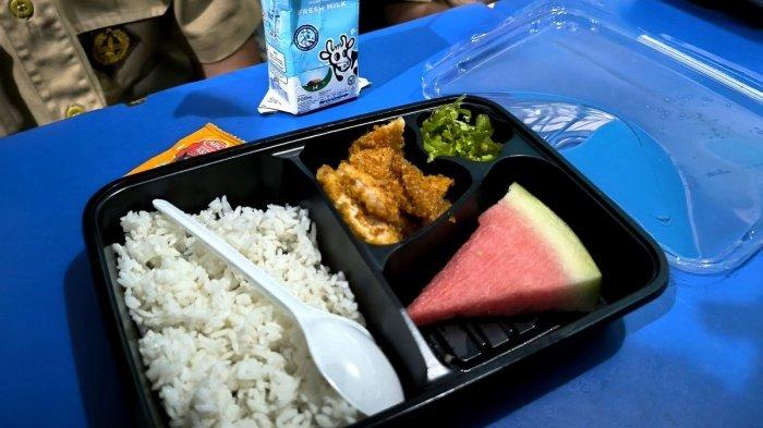 MAKAN BERGIZI GRATIS - Ilustrasi uji coba MBG kedua di Tangsel. Makan Bergizi Gratis atau MBG mulai kapan? Jadwal tahap pertama di 932 titik. BGN tegaskan tak ada pungutan liar atau pungli.