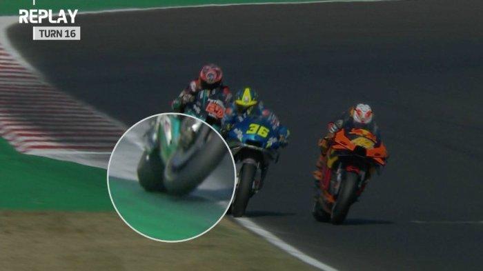 HASIL MOTOGP - Motor Fabio Quartararo melewati batas lintasan pada Tikungan 16 di MotoGP Emilia Romagna, Minggu (20/9/2020).Inilah hasil MotoGP Belanda hari ini dan klasemen MotoGP 2025 terbaru, cek juga track limit warning MotoGP artinya adalah apa.