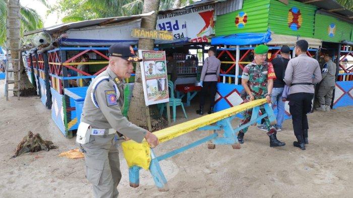 Penertiban lapak pedagang di Pantai Beras Basah Bontang.TRIBUNKALTIM.CO/ISMAIL USMAN