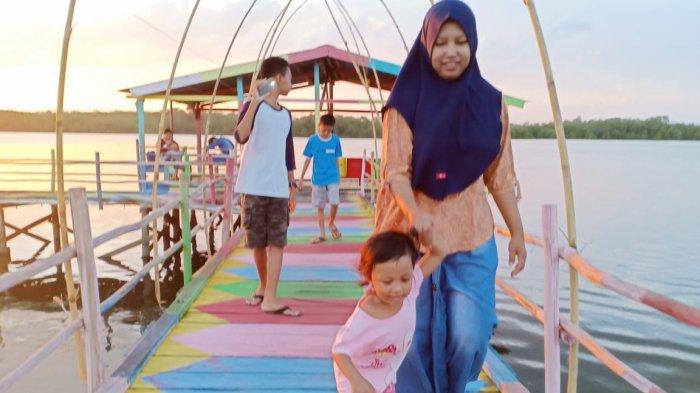 Kampung Warna Warni Desa Janju salah satu objek wisata Kabupaten Paser yang direkomendasikan Disporpar Paser.