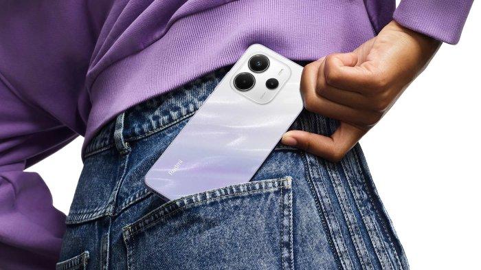 ILUSTRASI HP REDMI - Desain hp Redmi Note 14 (4G) warna Mist Purple yang diambil di laman mi.co.id pada Rabu (5/2/2025). Harga dan spesifikasi Redmi Note 14 (4G) di Indonesia, harga murah punya fitur AI.