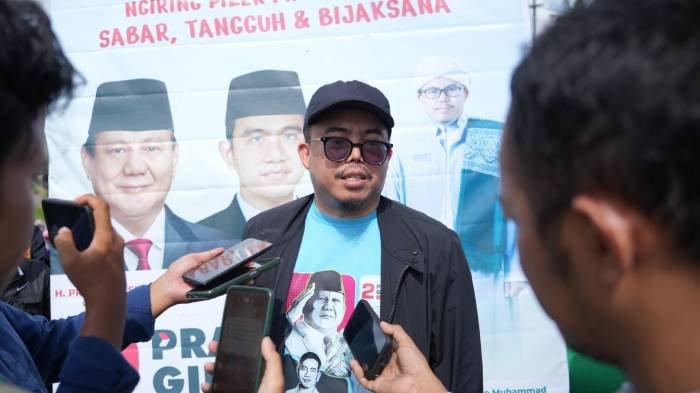 Dewan Penasihat Tim Kampanye Nasional (TKN) Prabowo-Gibran Lalu Gede Muhammad Zainuddin Atsani memberikan keterangan usai kegiatan jalan sehat dan senam gemoy, Minggu (4/2/2024).