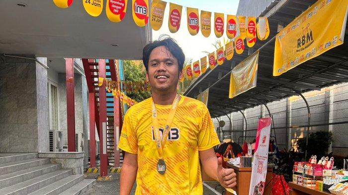 Zaenal, pelari IM3 Fun Run